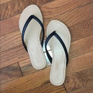 Black strap flip flops